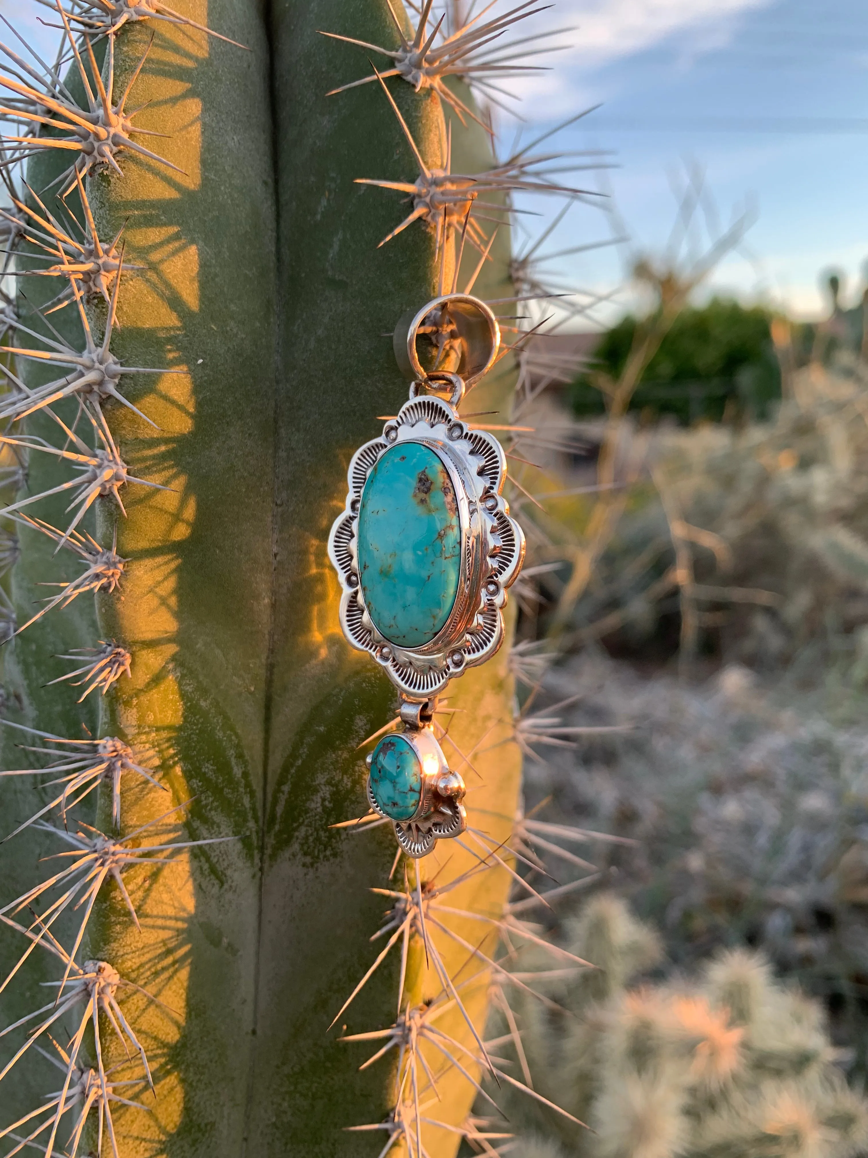 A Turquoise Scalloped Pendant