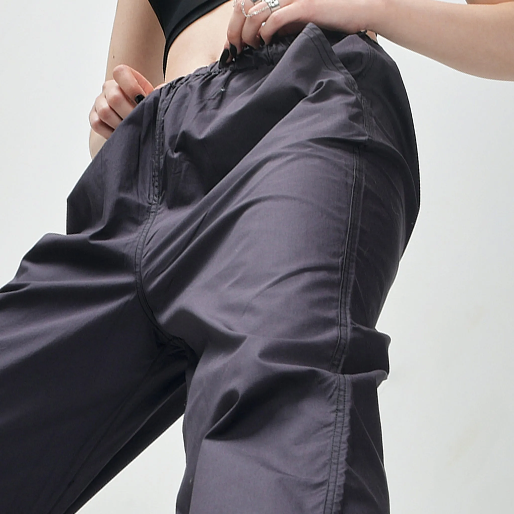 Black Ruffle Top & Gunmetal Parachute Pants